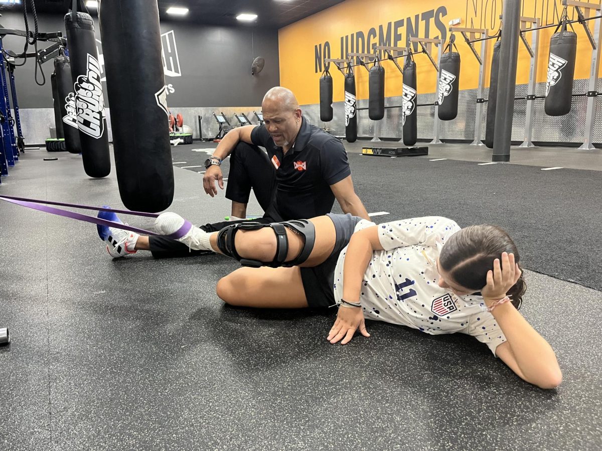 Chloe Armstrong (8) does leg strengthening exercises to aid her recovery.